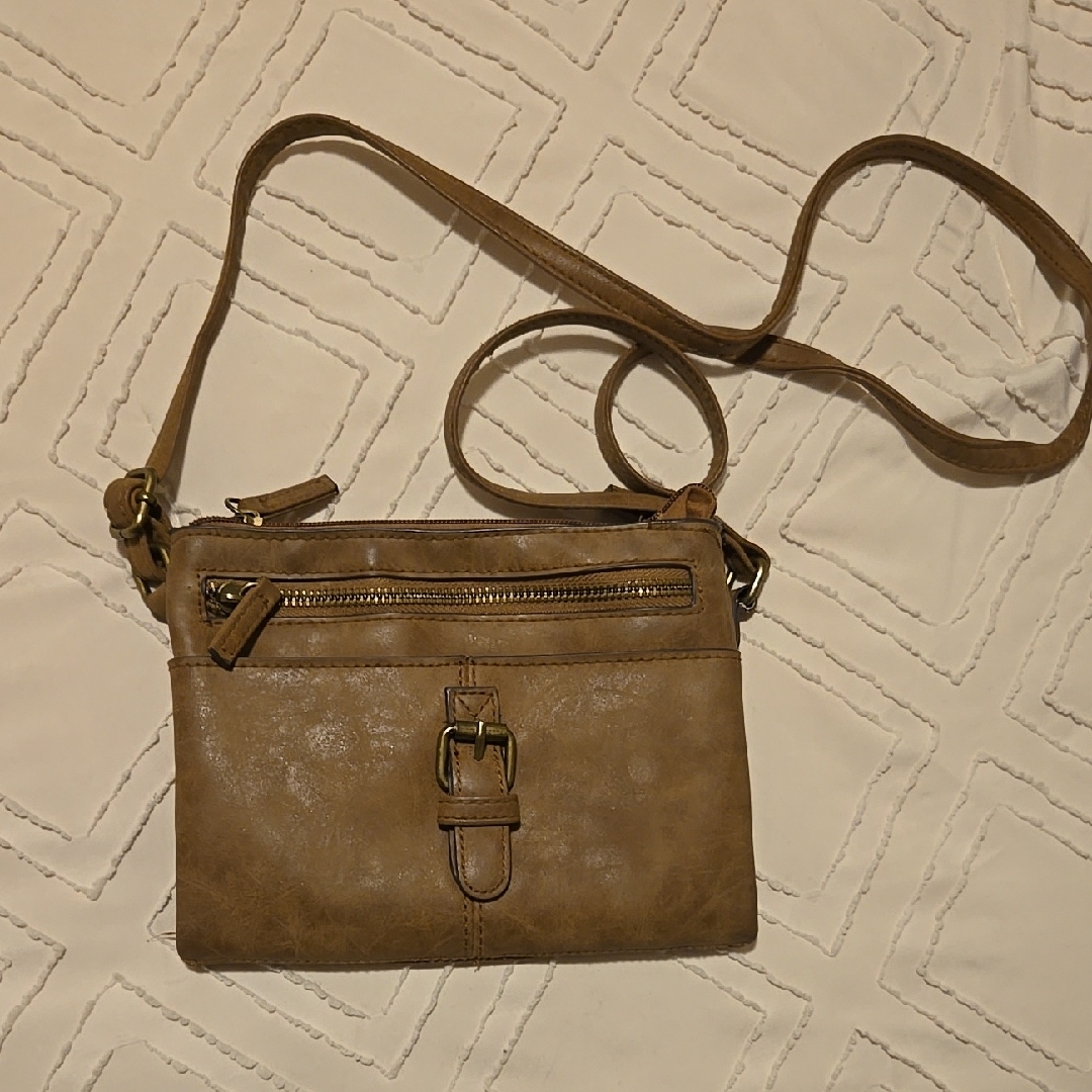 Brown Crossbody Bag With Adjustable Strap And Multiple Compartments
